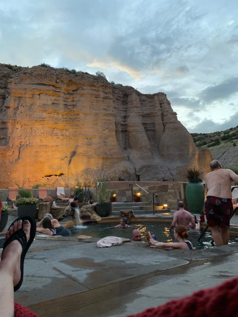 Legendary Healing Waters of Ojo Caliente soaking pool and cliffs