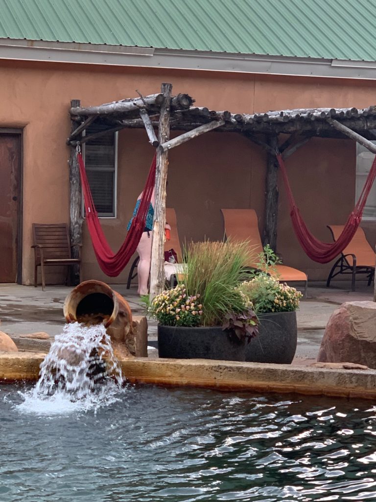 Legendary Healing Waters of Ojo Caliente soaking pool and hammocks.
